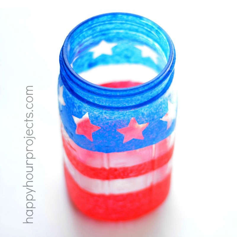 DIY Painted Patriotic Mason Jar Luminary at www.happyhourprojects.com