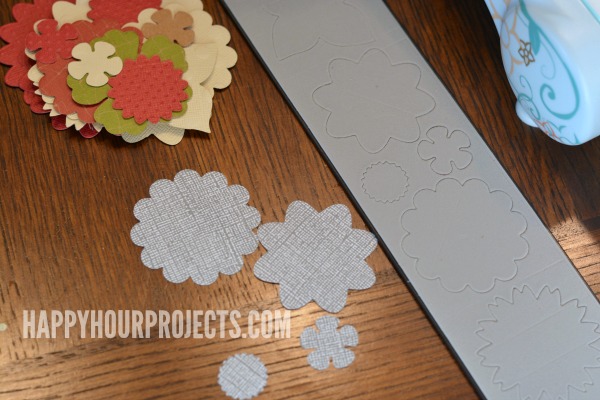 Flower Topped Mason Jar Cheesecakes at www.happyhourprojects.com