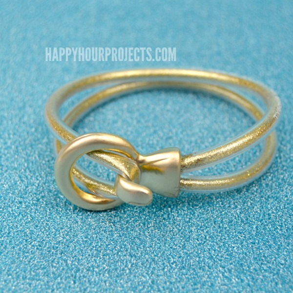 DIY Gold Glitter Looped Bracelet Made From Plastic Tubing at www.happyhourprojects.com