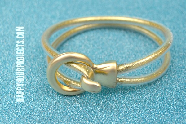 DIY Gold Glitter Looped Bracelet Made From Plastic Tubing at www.happyhourprojects.com