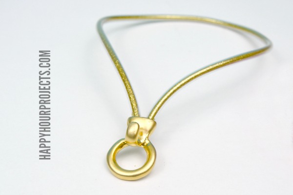 DIY Gold Glitter Looped Bracelet Made From Plastic Tubing at www.happyhourprojects.com