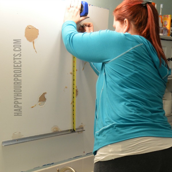 Bathroom Makeover Update at www.happyhourprojects.com | Paint and Medicine Cabinet Installation
