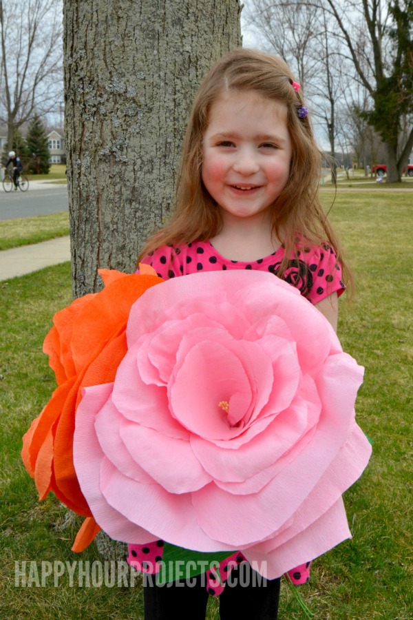 How to Make Giant Crepe Paper Flowers at www.happyhourprojects.com | An inexpensive project that's great for weddings, photo props, gifts and more! 