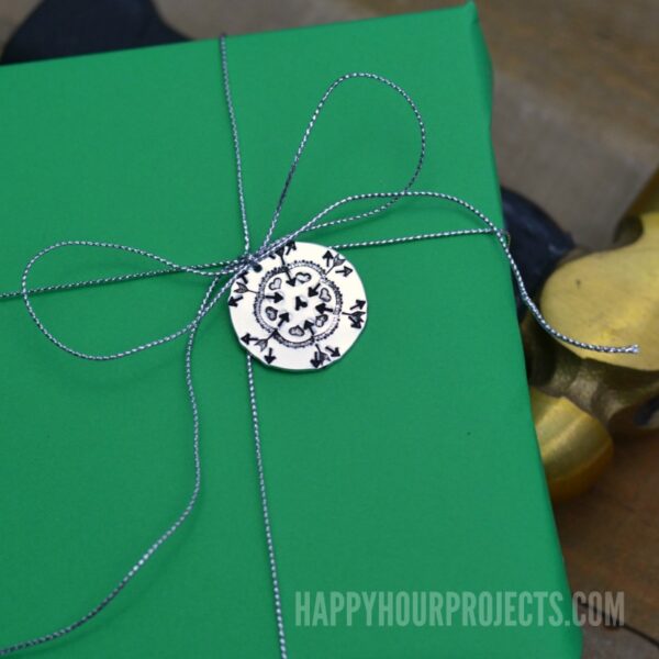Hand Stamped Gift Tags | Using Design Stamps to Make Snowflakes at happyhourprojects.com