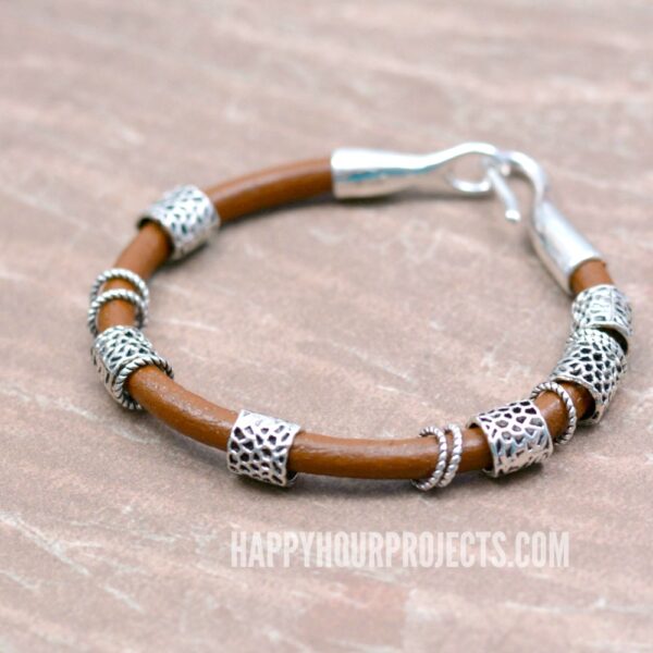 Boho Bangles | DIY leather bracelet with pewter beads and rings - tutorial at happyhourprojects.com
