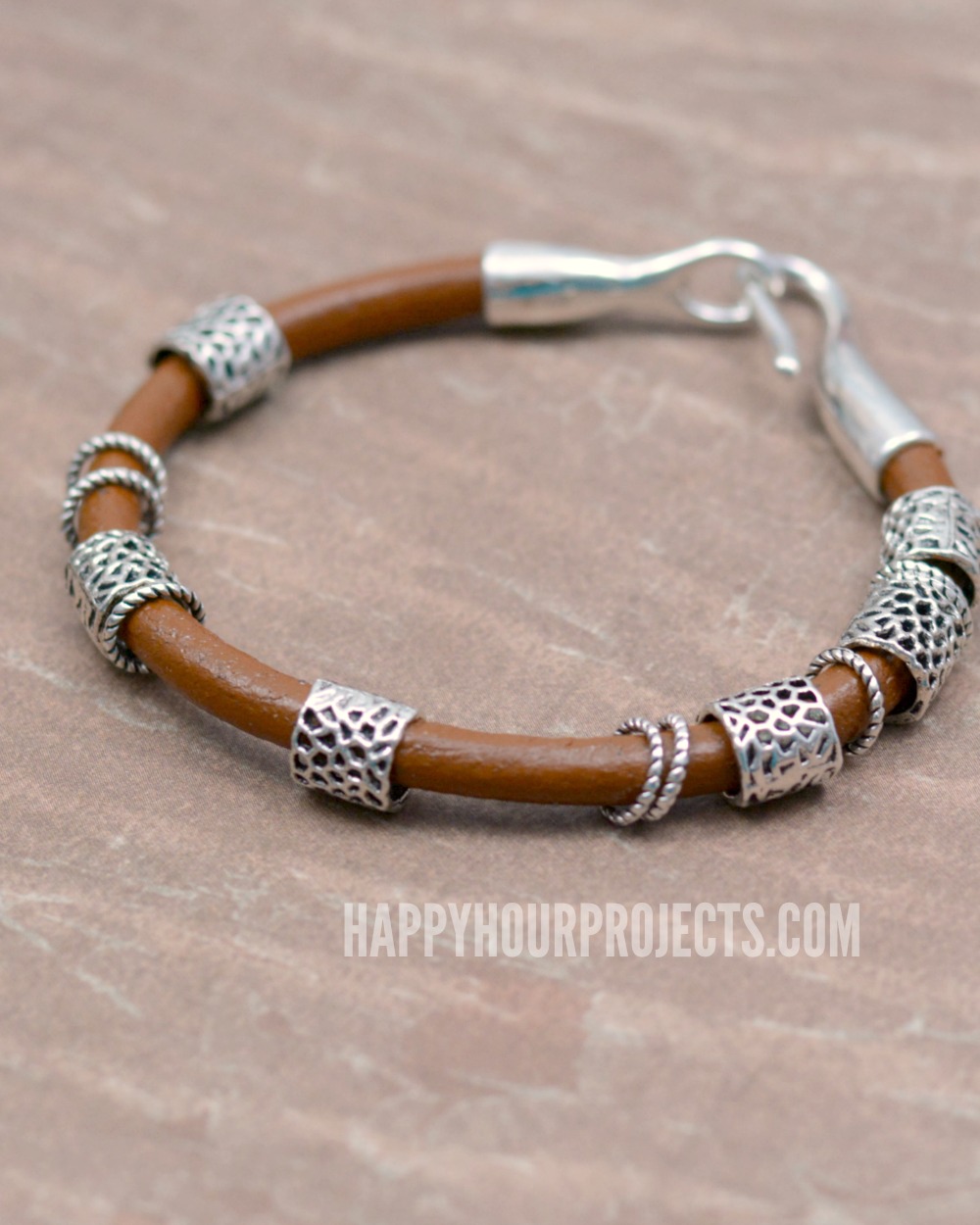 Boho Bangles | DIY leather bracelet with pewter beads and rings - tutorial at happyhourprojects.com