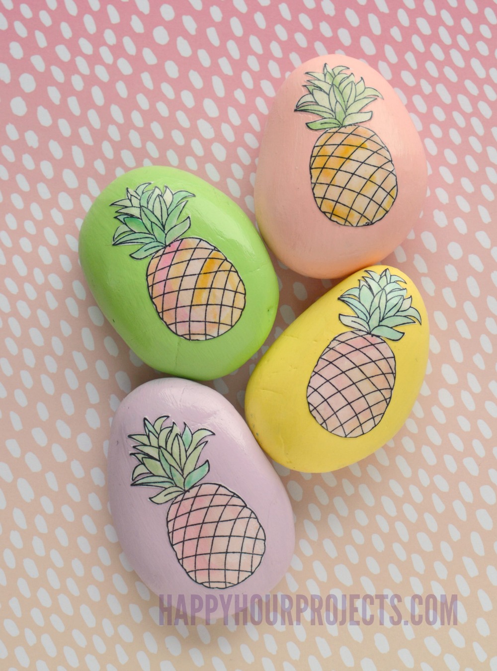 Easy Pineapple Decoupage Painted Rocks at happyhourprojects.com Make awesome painted rocks using stamps, paper and decoupage medium! Mod Podge is great for adding images to plain painted rocks.
