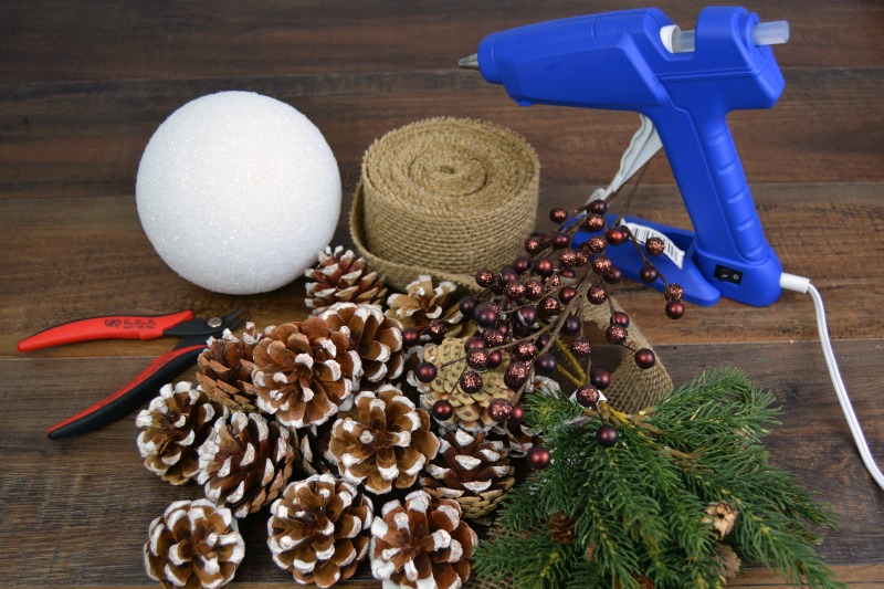 DIY Pinecone Kissing Ball at happyhourprojects.com | Make this Christmas wreath alternative for your DIY Christmas decor this year!  A DIY Pinecone kissing ball looks great all winter, and it's so easy to make!